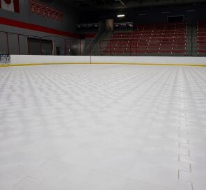 Versare flooring covers ice in an ice arena