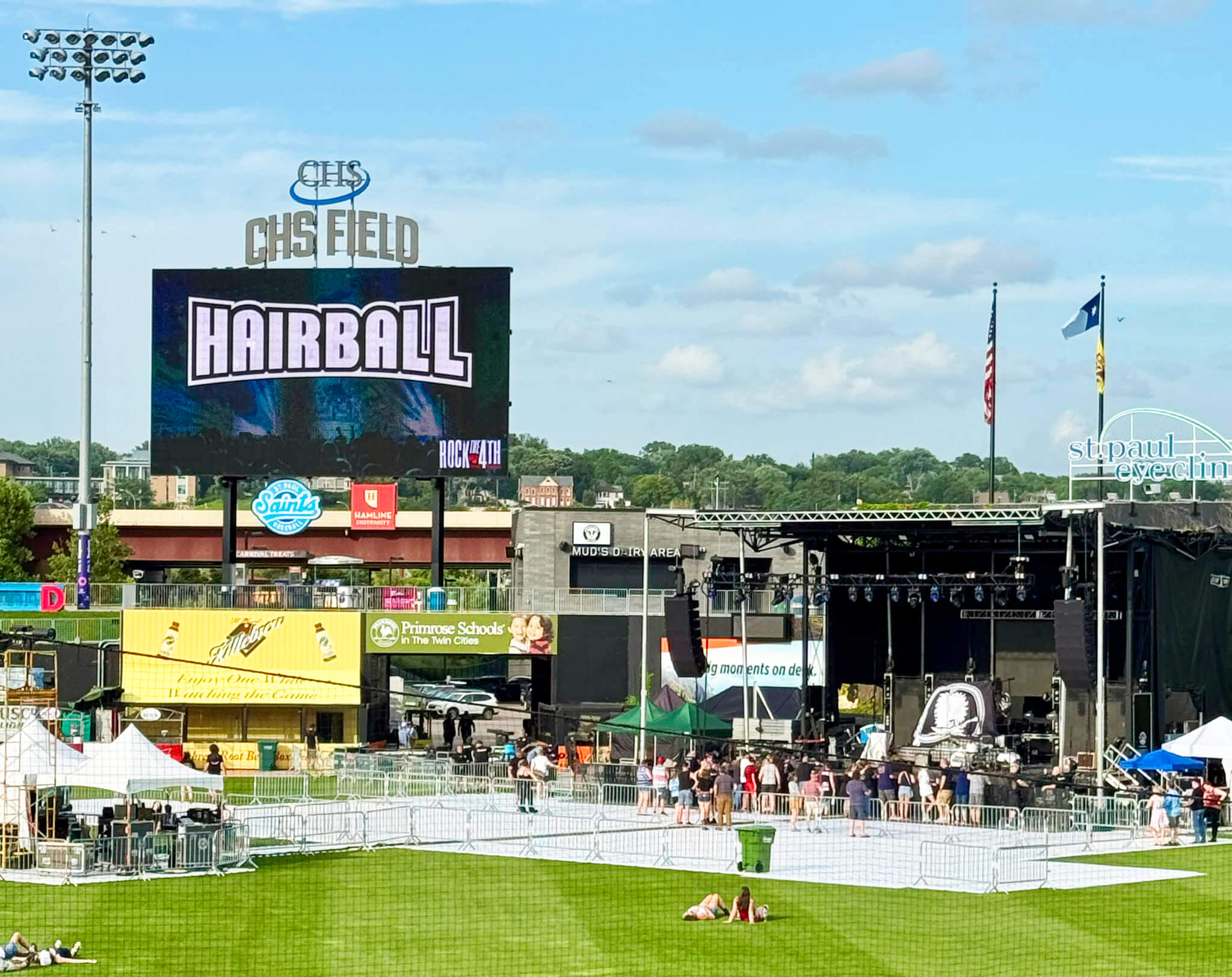Versare EverBase flooring tiles covering a baseball field. A large stage is set up on top of the flooring.