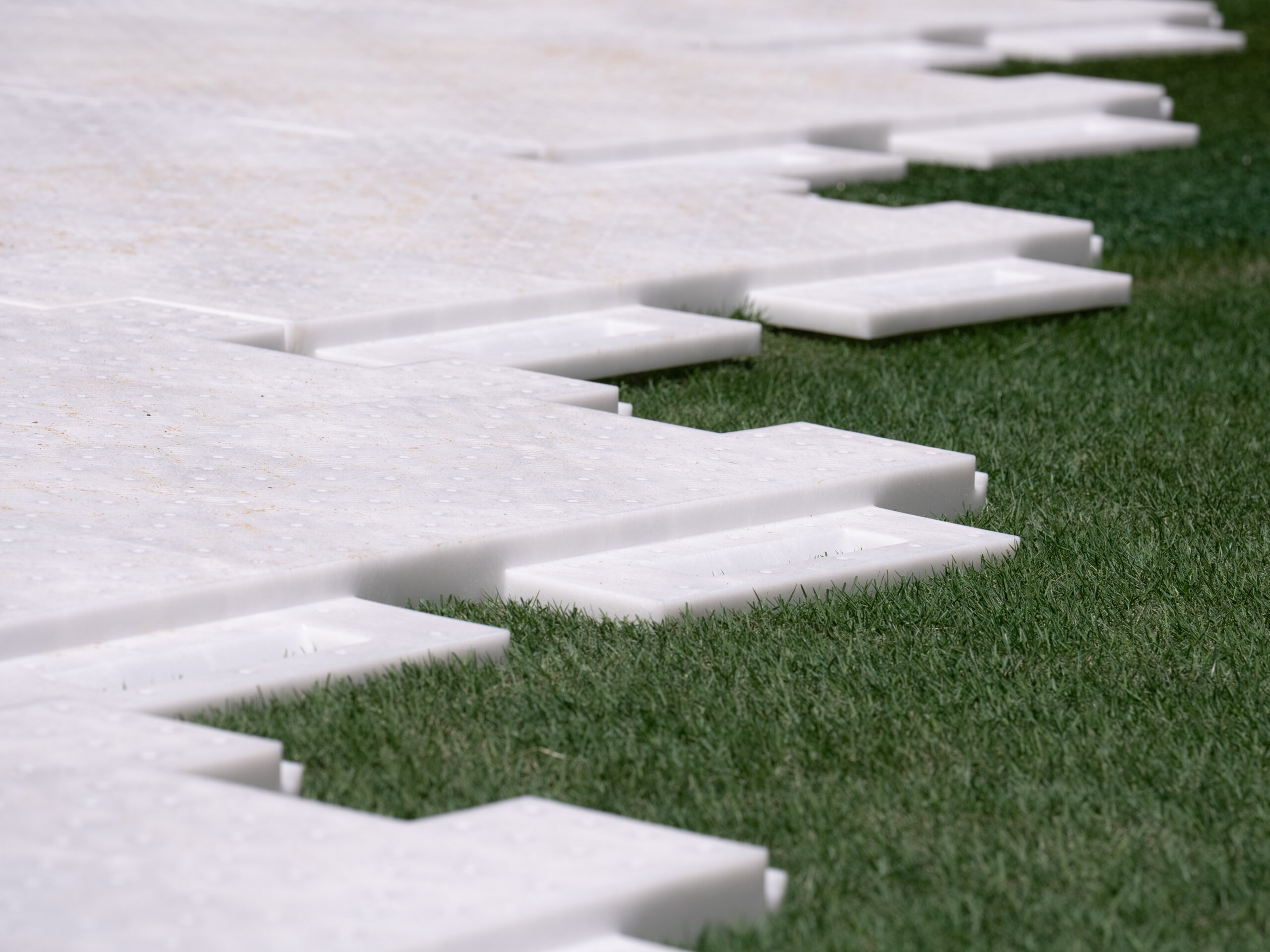 Modular flooring laying on grass or turf